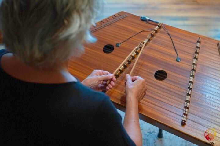 Playing Hammered Dulcimer