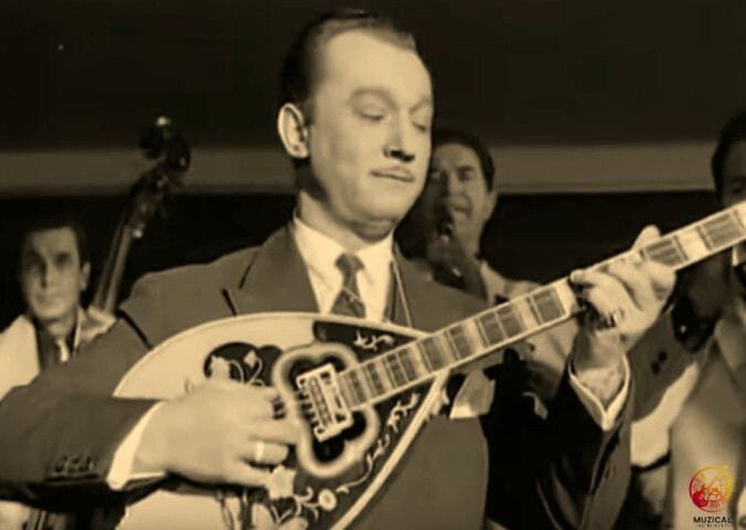 Manolis Chiotis, playing bouzouki