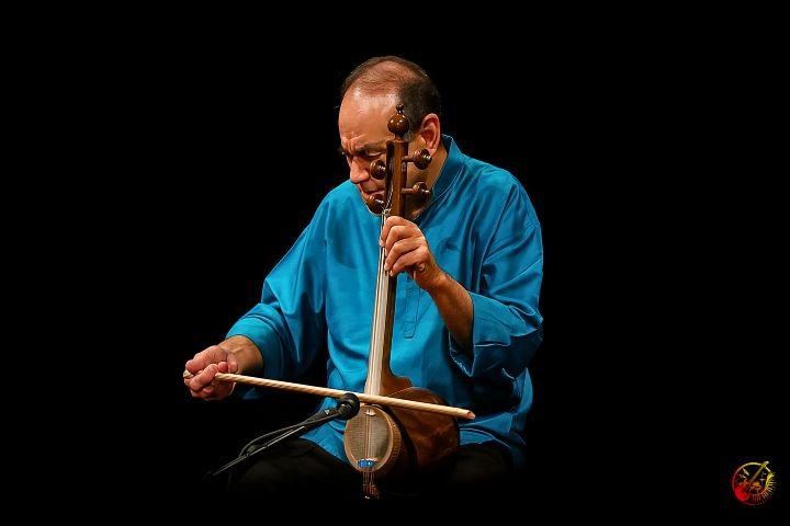 Playing with Kamancheh bow